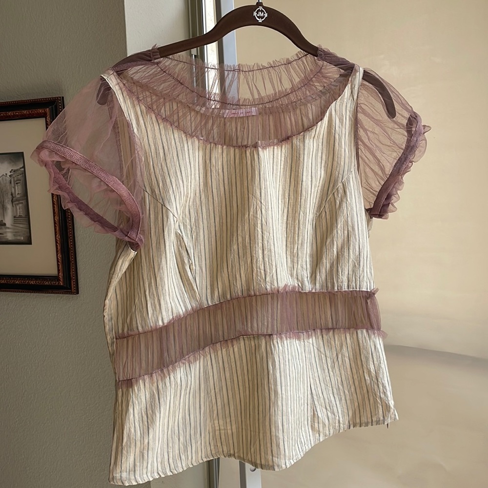 top with tulle cutouts